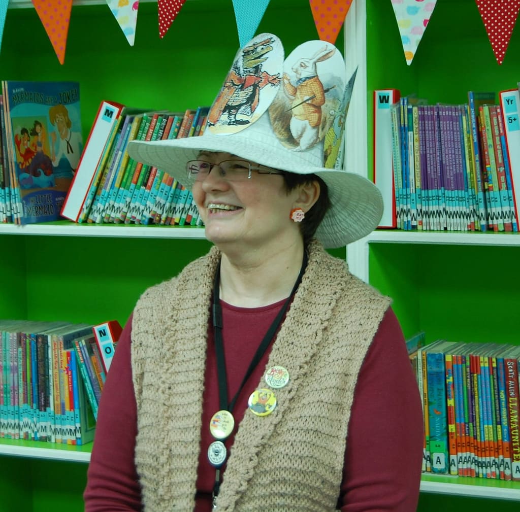 Lynda celebrating World Book Day wearing a homemade Wind in the Willows hat